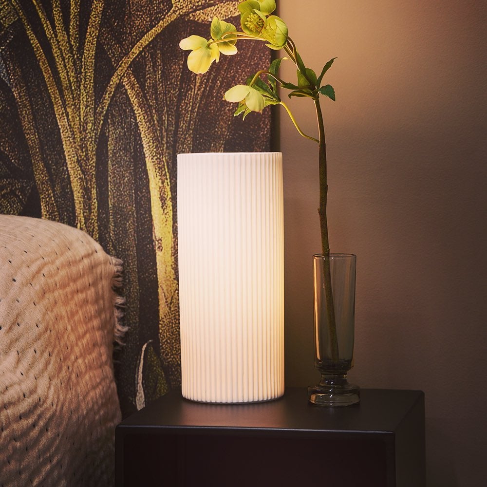 This simple ‘corrugated’ cylinder lamp adds a soft warm glow to bedsides or bookcases.
Created in porcelain and available in two sizes.
.
.
#tablelamp #tablelamps #lamps #lighting #lights #bedside #bedsidelamp